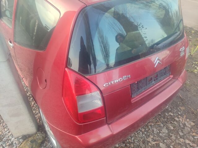 Красный Ситроен С2, объемом двигателя 1.6 л и пробегом 105 тыс. км за 2200 $, фото 1 на Automoto.ua