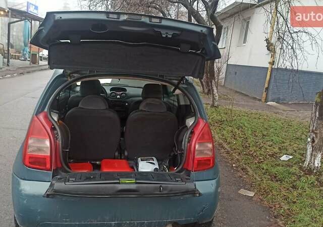 Синий Ситроен С2, объемом двигателя 1.4 л и пробегом 258 тыс. км за 3300 $, фото 5 на Automoto.ua