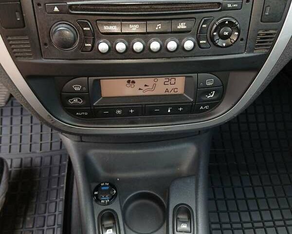 Синій Сітроен С2, об'ємом двигуна 1.36 л та пробігом 165 тис. км за 3495 $, фото 12 на Automoto.ua