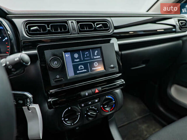 Білий Сітроен С3, об'ємом двигуна 1.2 л та пробігом 51 тис. км за 13447 $, фото 15 на Automoto.ua