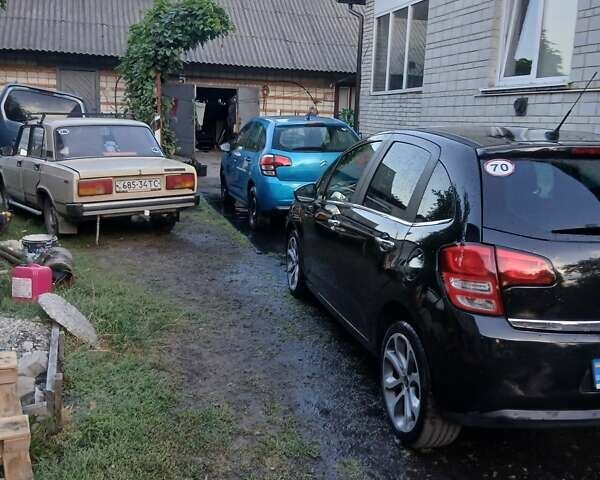 Черный Ситроен С3, объемом двигателя 1.4 л и пробегом 150 тыс. км за 5200 $, фото 16 на Automoto.ua