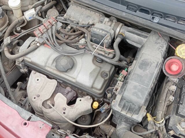 Красный Ситроен С3, объемом двигателя 1.4 л и пробегом 260 тыс. км за 2700 $, фото 6 на Automoto.ua