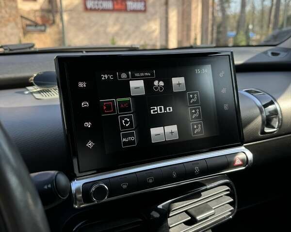 Жовтий Сітроен C4 Кактус, об'ємом двигуна 1.2 л та пробігом 98 тис. км за 10600 $, фото 12 на Automoto.ua