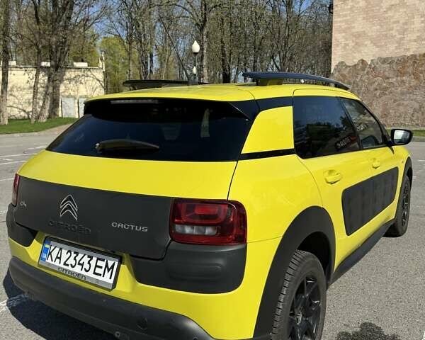 Жовтий Сітроен C4 Кактус, об'ємом двигуна 1.2 л та пробігом 98 тис. км за 10600 $, фото 3 на Automoto.ua