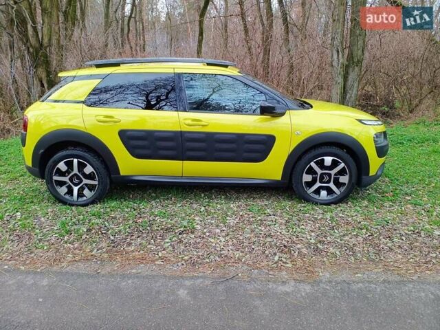 Желтый Ситроен C4 Кактус, объемом двигателя 1.56 л и пробегом 106 тыс. км за 11800 $, фото 6 на Automoto.ua