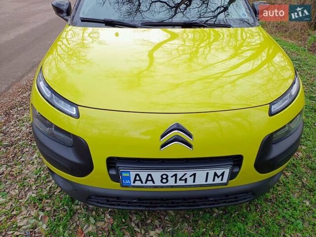 Желтый Ситроен C4 Кактус, объемом двигателя 1.56 л и пробегом 106 тыс. км за 11800 $, фото 5 на Automoto.ua