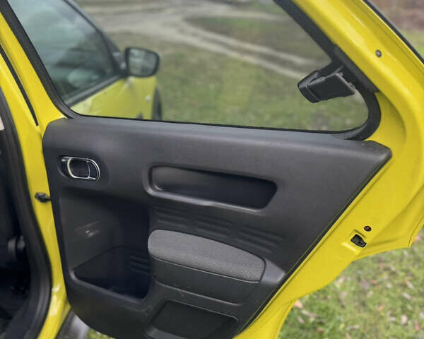 Жовтий Сітроен C4 Кактус, об'ємом двигуна 1.2 л та пробігом 89 тис. км за 9499 $, фото 20 на Automoto.ua