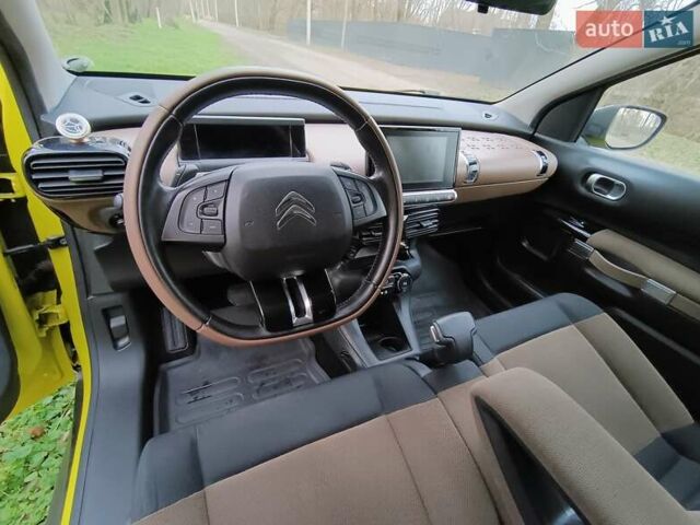 Желтый Ситроен C4 Кактус, объемом двигателя 1.56 л и пробегом 106 тыс. км за 11800 $, фото 16 на Automoto.ua