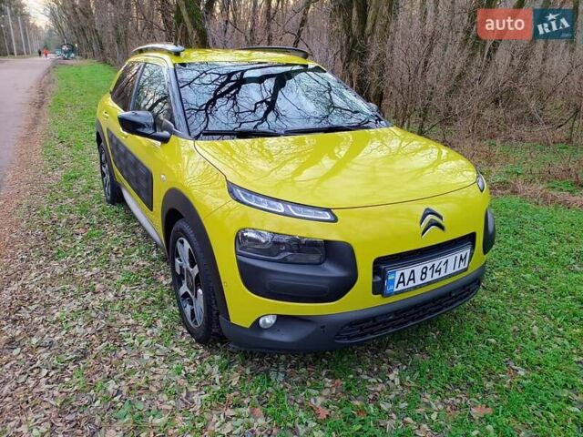 Желтый Ситроен C4 Кактус, объемом двигателя 1.56 л и пробегом 106 тыс. км за 11800 $, фото 4 на Automoto.ua