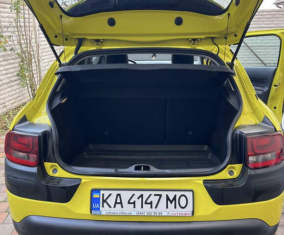 Жовтий Сітроен C4 Кактус, об'ємом двигуна 1.56 л та пробігом 91 тис. км за 12200 $, фото 4 на Automoto.ua