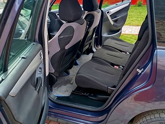 Ситроен Ц4 Гранд Пикассо 2010 в Тернополе на Automoto.ua Синий Ситроен Ц4 Гранд Пикассо, объемом двигателя 1.6 л и пробегом 205 тыс. км за 6100 $, фото 6 на Automoto.ua