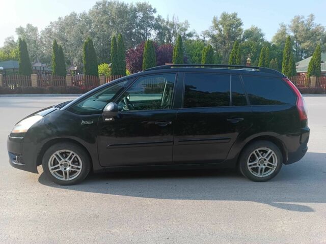 Черный Ситроен С4 Пикассо, объемом двигателя 1.7 л и пробегом 306 тыс. км за 5200 $, фото 1 на Automoto.ua