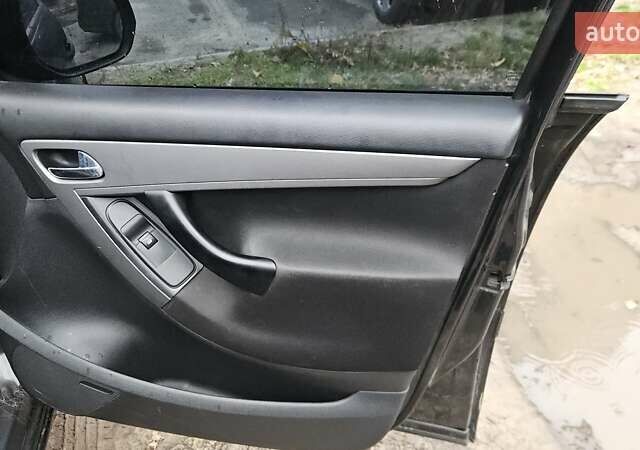 Черный Ситроен С4 Пикассо, объемом двигателя 1.75 л и пробегом 257 тыс. км за 5300 $, фото 9 на Automoto.ua