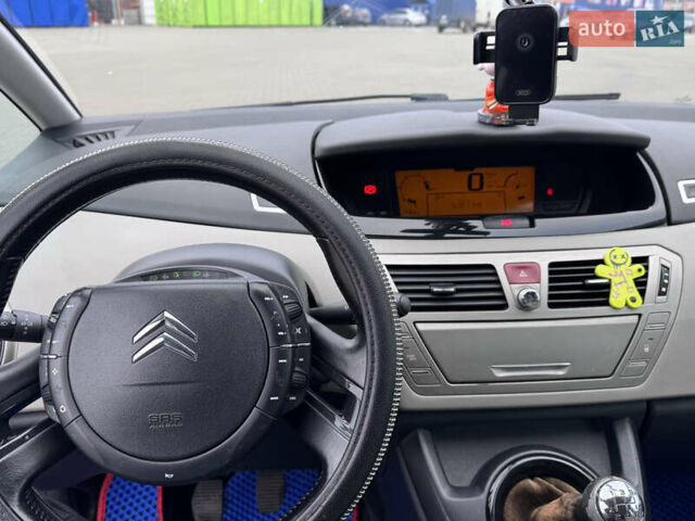 Фіолетовий Сітроен С4 Пікассо, об'ємом двигуна 1.56 л та пробігом 331 тис. км за 5499 $, фото 21 на Automoto.ua