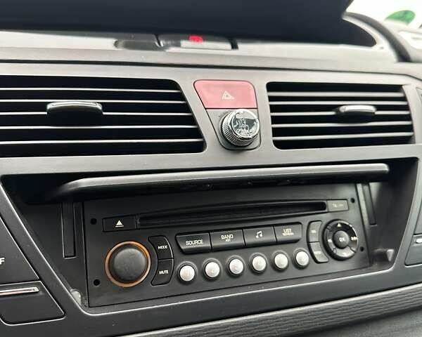 Фиолетовый Ситроен С4 Пикассо, объемом двигателя 2 л и пробегом 205 тыс. км за 7600 $, фото 32 на Automoto.ua