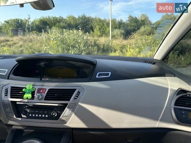 Красный Ситроен С4 Пикассо, объемом двигателя 1.7 л и пробегом 187 тыс. км за 6500 $, фото 32 на Automoto.ua