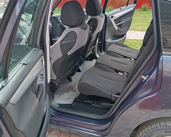 Синий Ситроен С4 Пикассо, объемом двигателя 1.56 л и пробегом 205 тыс. км за 6000 $, фото 10 на Automoto.ua