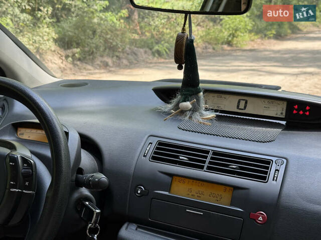 Белый Ситроен С4, объемом двигателя 1.59 л и пробегом 153 тыс. км за 4490 $, фото 18 на Automoto.ua