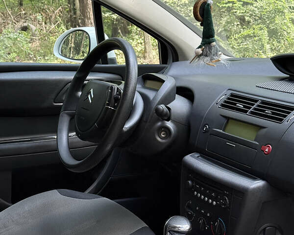 Белый Ситроен С4, объемом двигателя 1.59 л и пробегом 153 тыс. км за 4490 $, фото 11 на Automoto.ua