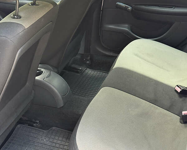 Белый Ситроен С4, объемом двигателя 1.59 л и пробегом 153 тыс. км за 4490 $, фото 10 на Automoto.ua