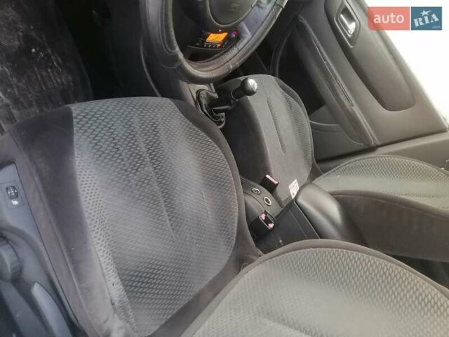 Белый Ситроен С4, объемом двигателя 1.59 л и пробегом 277 тыс. км за 3000 $, фото 5 на Automoto.ua