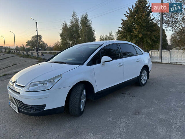Белый Ситроен С4, объемом двигателя 1.6 л и пробегом 227 тыс. км за 4850 $, фото 1 на Automoto.ua