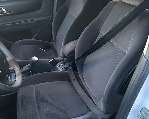 Белый Ситроен С4, объемом двигателя 1.6 л и пробегом 227 тыс. км за 4600 $, фото 8 на Automoto.ua