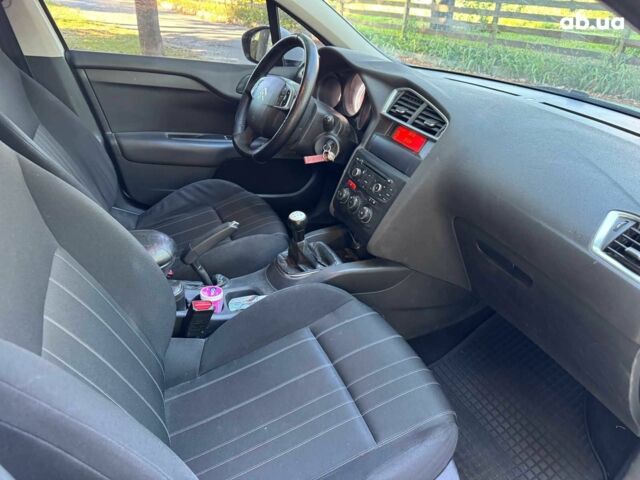 Белый Ситроен С4, объемом двигателя 1.6 л и пробегом 234 тыс. км за 6490 $, фото 19 на Automoto.ua