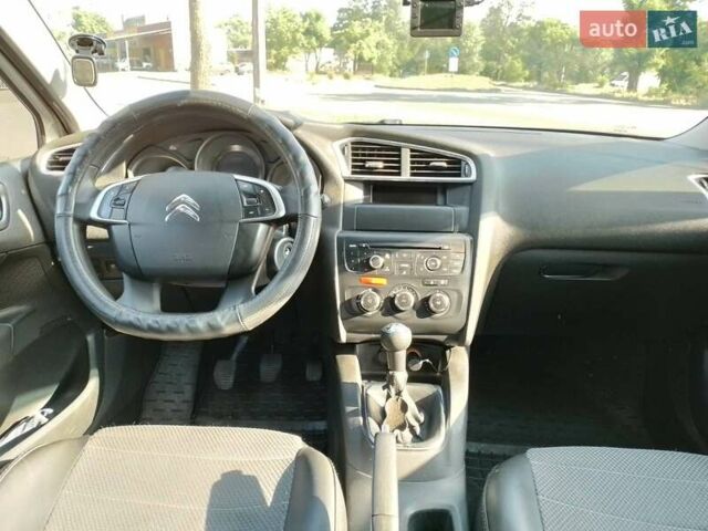 Білий Сітроен С4, об'ємом двигуна 1.59 л та пробігом 264 тис. км за 6800 $, фото 6 на Automoto.ua