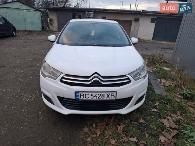 Белый Ситроен С4, объемом двигателя 1.6 л и пробегом 241 тыс. км за 5200 $, фото 1 на Automoto.ua