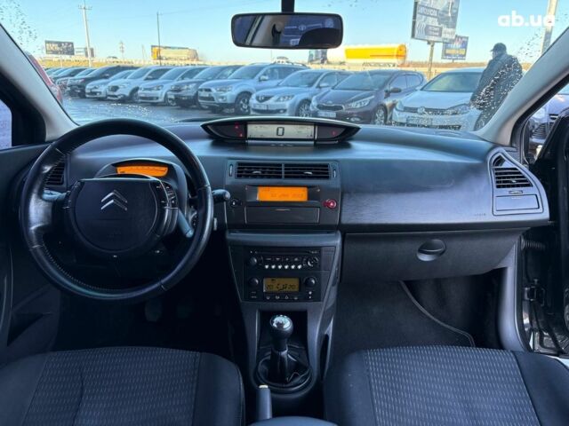 Белый Ситроен С4, объемом двигателя 1.2 л и пробегом 209 тыс. км за 5690 $, фото 36 на Automoto.ua