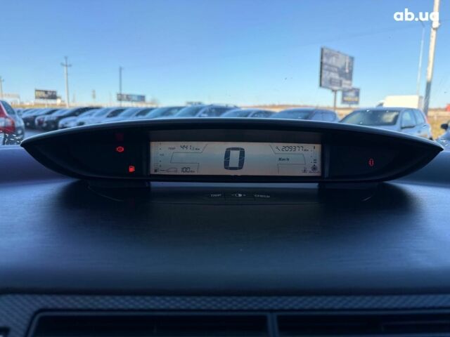 Белый Ситроен С4, объемом двигателя 1.2 л и пробегом 209 тыс. км за 5690 $, фото 24 на Automoto.ua