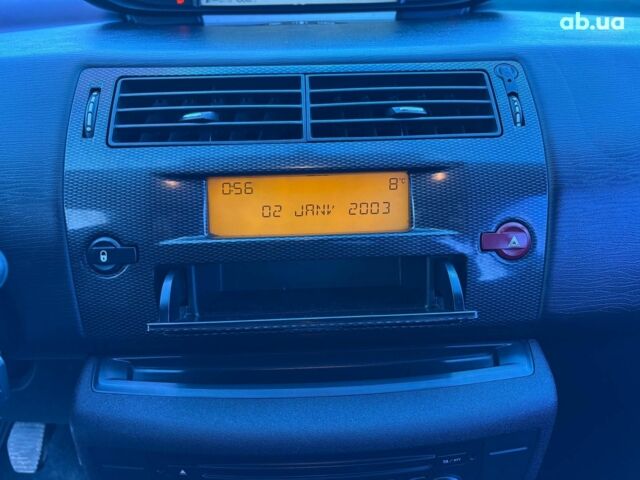 Белый Ситроен С4, объемом двигателя 1.2 л и пробегом 209 тыс. км за 5690 $, фото 25 на Automoto.ua