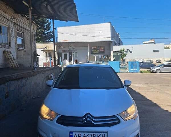 Белый Ситроен С4, объемом двигателя 1.59 л и пробегом 194 тыс. км за 7000 $, фото 1 на Automoto.ua