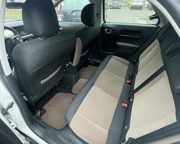 Білий Сітроен С4, об'ємом двигуна 1.2 л та пробігом 208 тис. км за 7500 $, фото 3 на Automoto.ua