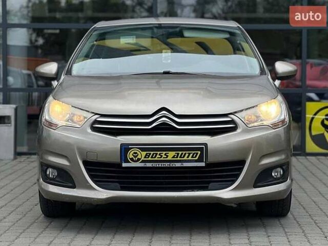 Бежевый Ситроен С4, объемом двигателя 1.6 л и пробегом 208 тыс. км за 6500 $, фото 1 на Automoto.ua