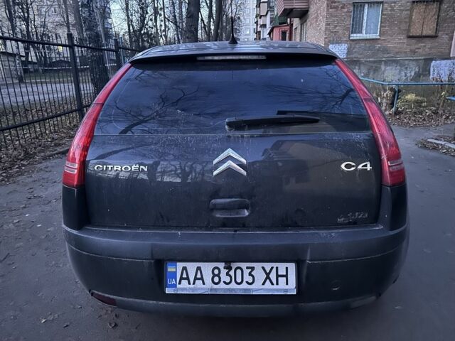 Черный Ситроен С4, объемом двигателя 1.4 л и пробегом 331 тыс. км за 3000 $, фото 3 на Automoto.ua