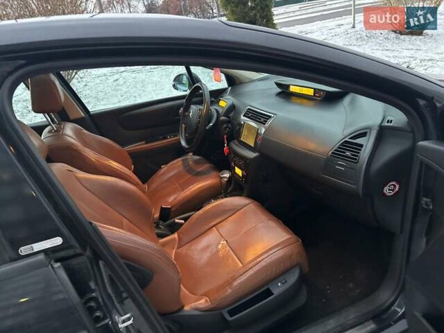 Черный Ситроен С4, объемом двигателя 2 л и пробегом 244 тыс. км за 4500 $, фото 6 на Automoto.ua