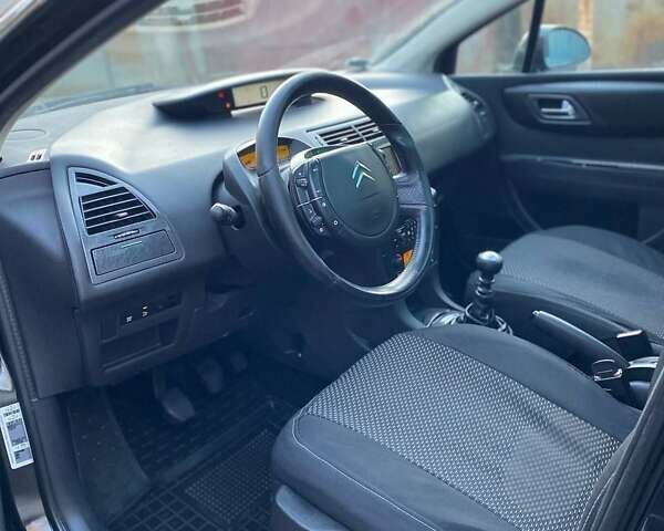 Черный Ситроен С4, объемом двигателя 2 л и пробегом 245 тыс. км за 4250 $, фото 14 на Automoto.ua