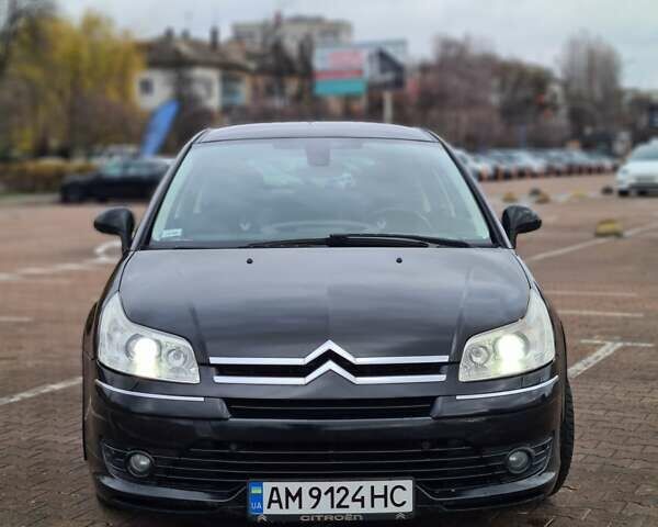 Черный Ситроен С4, объемом двигателя 2 л и пробегом 245 тыс. км за 4450 $, фото 4 на Automoto.ua