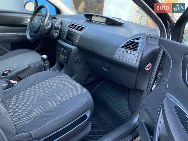 Черный Ситроен С4, объемом двигателя 2 л и пробегом 245 тыс. км за 4450 $, фото 29 на Automoto.ua