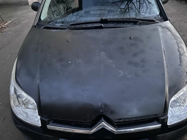 Черный Ситроен С4, объемом двигателя 1.4 л и пробегом 331 тыс. км за 3000 $, фото 4 на Automoto.ua