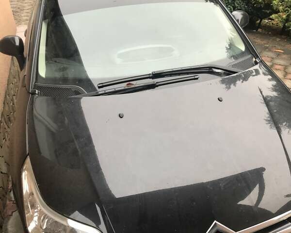 Черный Ситроен С4, объемом двигателя 1.59 л и пробегом 190 тыс. км за 4500 $, фото 1 на Automoto.ua