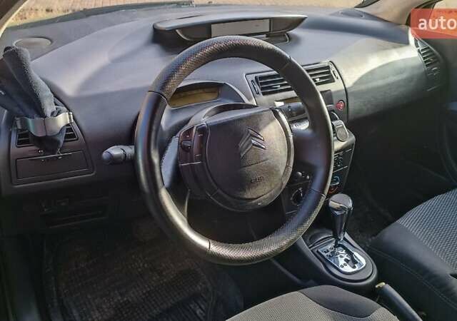 Чорний Сітроен С4, об'ємом двигуна 1.6 л та пробігом 210 тис. км за 4600 $, фото 1 на Automoto.ua