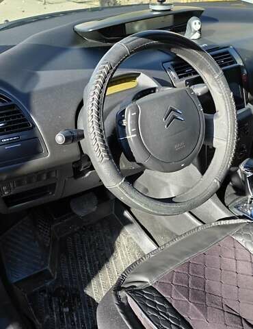 Черный Ситроен С4, объемом двигателя 1.62 л и пробегом 177 тыс. км за 6500 $, фото 4 на Automoto.ua