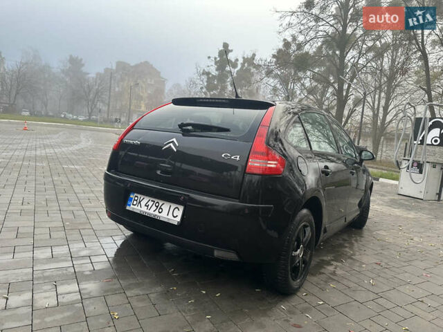 Черный Ситроен С4, объемом двигателя 1.56 л и пробегом 437 тыс. км за 4199 $, фото 6 на Automoto.ua