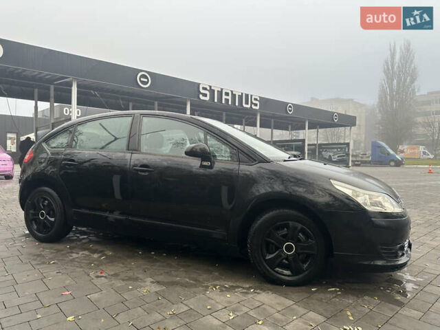 Черный Ситроен С4, объемом двигателя 1.56 л и пробегом 437 тыс. км за 4199 $, фото 7 на Automoto.ua