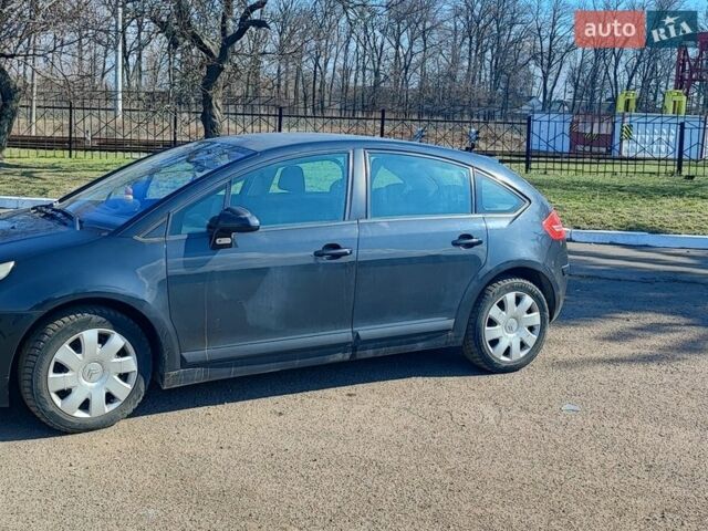 Черный Ситроен С4, объемом двигателя 1.59 л и пробегом 239 тыс. км за 4650 $, фото 1 на Automoto.ua