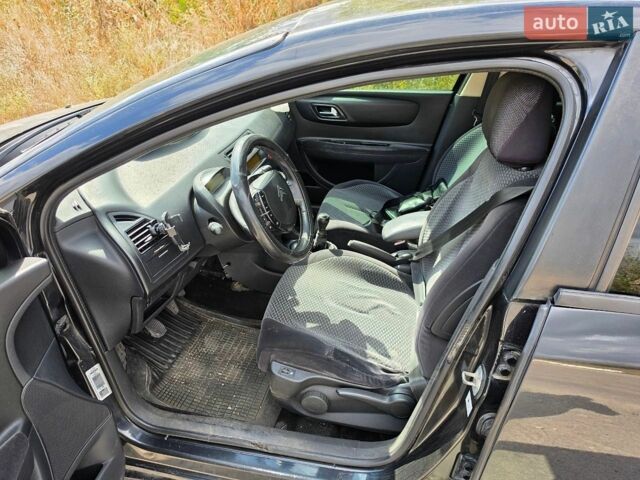 Черный Ситроен С4, объемом двигателя 1.6 л и пробегом 348 тыс. км за 3300 $, фото 8 на Automoto.ua