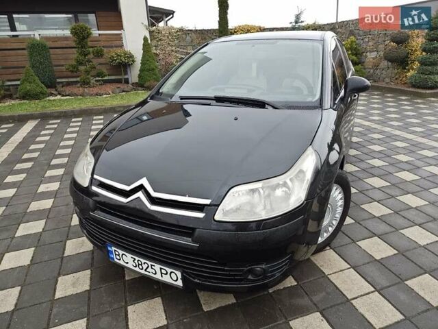 Черный Ситроен С4, объемом двигателя 1.6 л и пробегом 318 тыс. км за 3950 $, фото 7 на Automoto.ua
